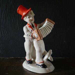 Vintage Accordion Player Porcelain Figurine with Cracked Egg Planter